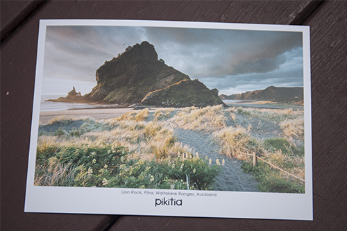 Postcard #085: Piha to Italy (front)
